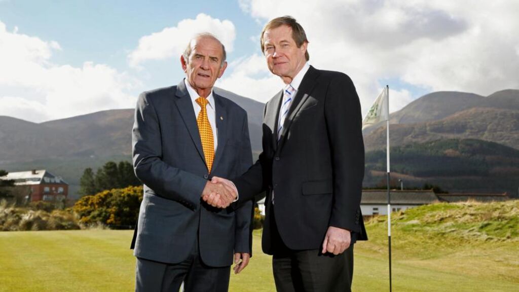 Colm McLoughlin, Executive Vice Chairman of Dubai Duty Free, and George O’Grady, Chief Executive of The European Tour, put pen to paper on the contract which sees Dubai Duty Free become the title sponsor of the 2015 Irish Open hosted by The Rory Foundation at Royal County Down Golf Club. Photograph: Darren Kidd/Inpho