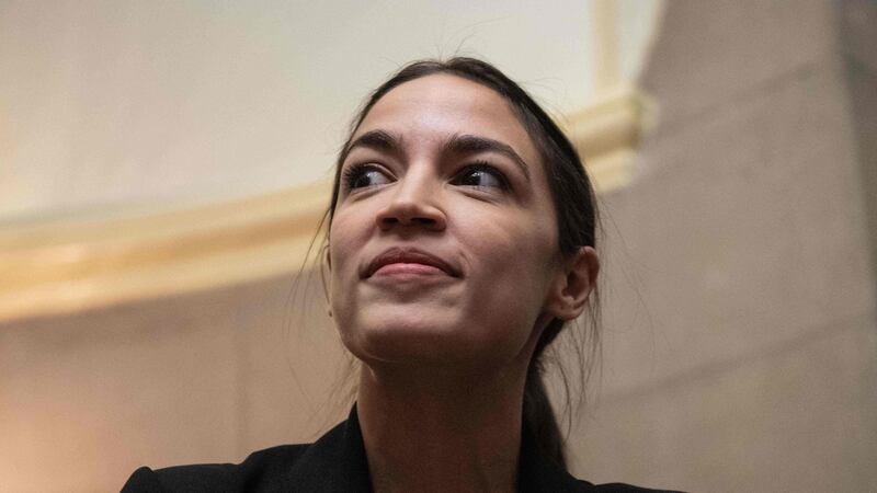 US Democratic representative from New York Alexandria Ocasio Cortez: tweeted that a Getty photo of women storming the halls of Congress looked like a Spice Girls album cover. Photograph: Nicholas Kamm/AFP