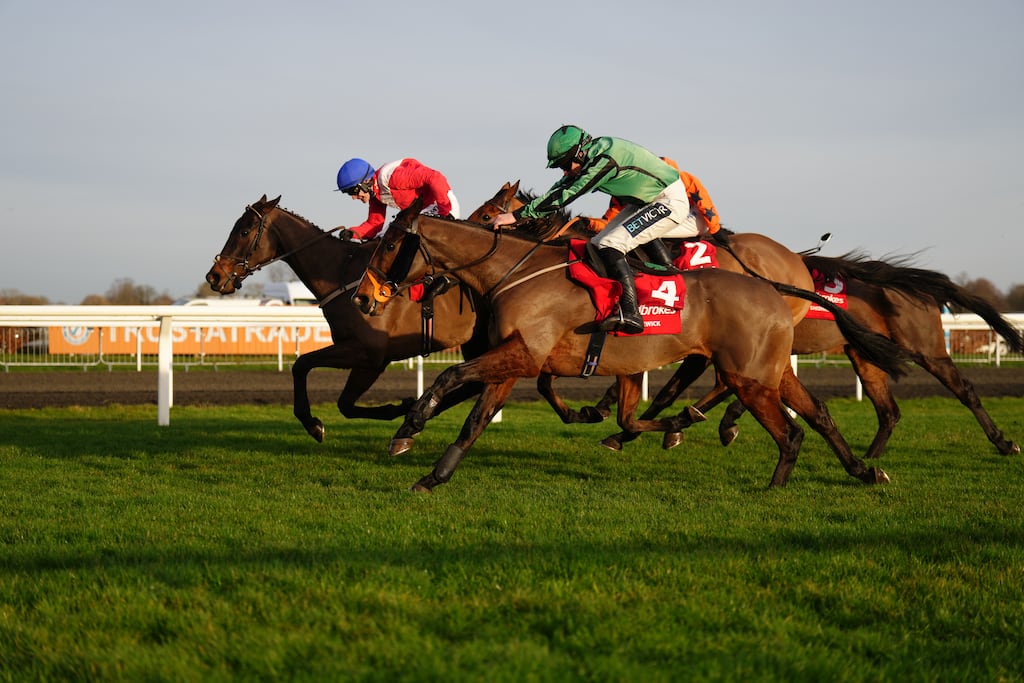 Hewick ridden by Gavin Sheehan (No 4) wins the Ladbrokes King George VI Chase at Kempton. Photograph: John Walton/PA Wire