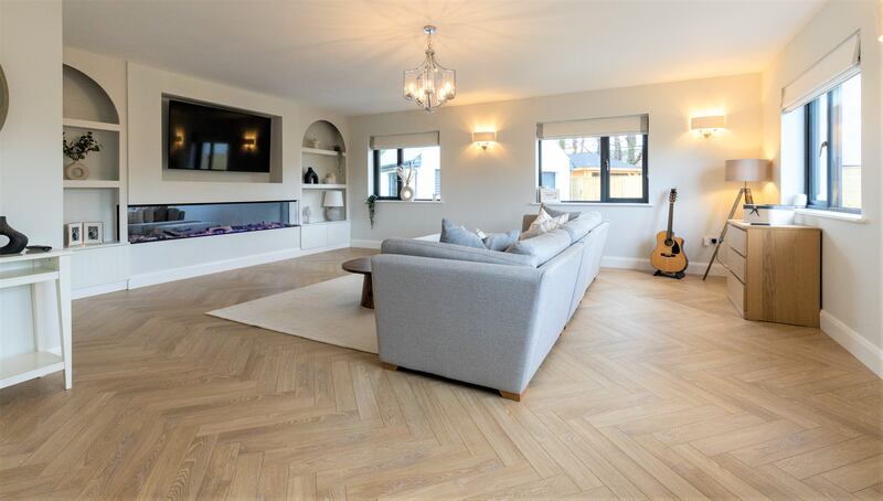 Flooring is oak herringbone parquet in the livingroom.