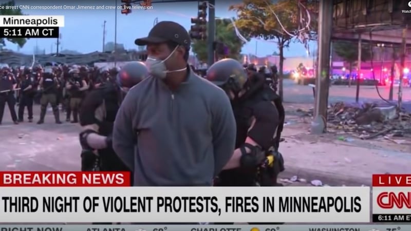 CNN reporter Omar Jimenez being arrested while covering the Minneapolis protests. Photograph:  CNN via the New York Times