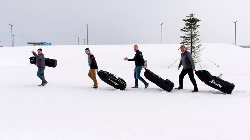 Alan O’Meara, Ronan Kelleher, Peter Wycombe and Tom Lenihan trudge through snow at Cork Airport with their bags, hoping not to suffer too much delay despite being on the way to Spain to play golf. Photograph: Michael Mac Sweeney/Provision