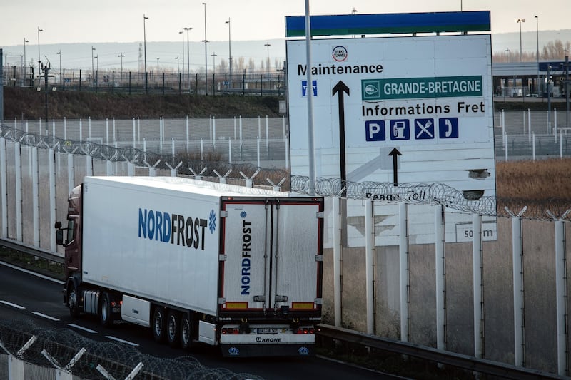 A refrigerated truck on an access road near the Euro Tunnel in Calais on New Year’s Eve. Photograph: Cyril Marcilhacy/Bloomberg