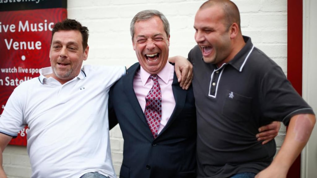 The leader of Britain’s United Kingdom Independence Party (Ukip), Nigel Farage (centre), celebrates with well-wishers during a stop at a pub to greet newly elected councillors in Basildon, southern England yesterday. Photograph: Andrew Winning/Reuters.