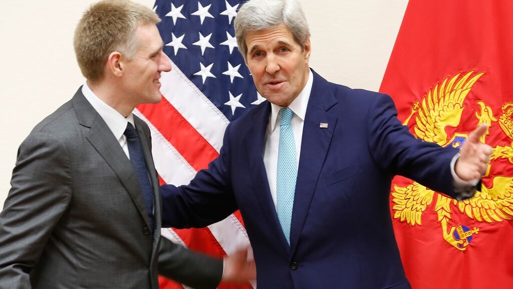 Montenegro’s Foreign Minister Igor Luksic with US Secretary of State John Kerry at Nato headquarters in Brussels. Photograph: Jonathan Ernst/AFP/Getty