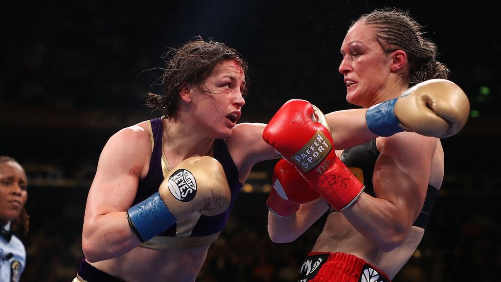 Katie Taylor and Delfine Persoon exchange punches during their WBA/WBO/IBF/WBC women’s lightweight unification fight at Madison Square Garden in June 2019. Photograph: Al Bello/Getty Images