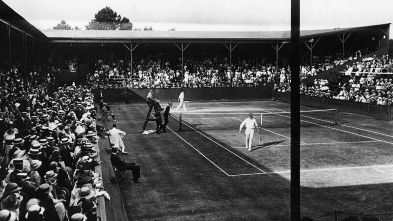 Action from June 1914 of Australian tennis player Norman Brookes in action against A E Beamish at the Wimbledon Lawn Tennis Championships. Photograph: Topical Press Agency/Getty Images