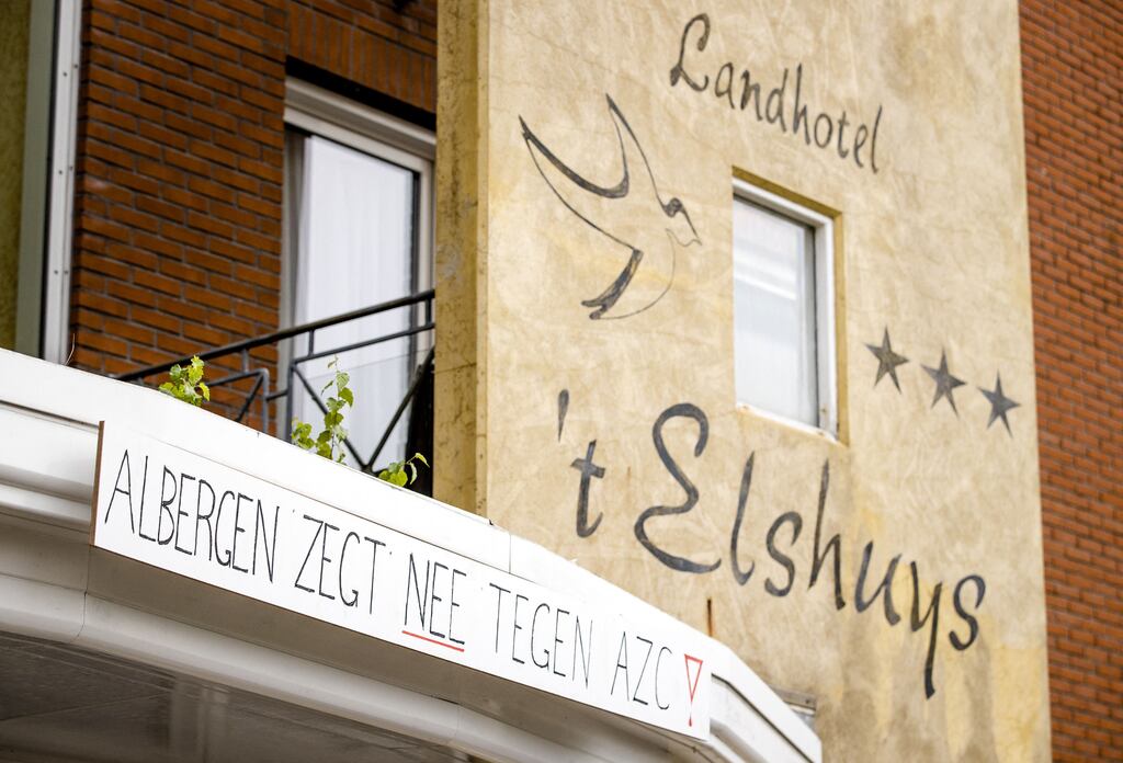 A sign 'Albergen is saying no to asylum centre' on the front of a hotel in Albergen, the Netherlands. Photograph:  Sem van der Wal/Getty Images