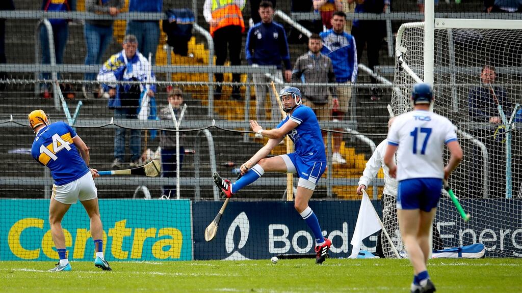 Tipperary’s Séamus Callahan scores his side’s second goal during the Munster SHC game against Waterford at Semple Stadium. Photograph: Ryan Byrne/Inpho