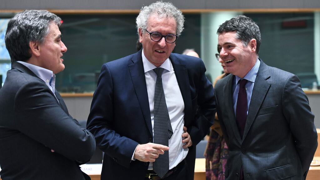 Minister for Finance Paschal Donohoe (right) with Greek finance minister Euclid Tsakalotos (left) and Luxembourg’s finance minister Pierre Gramegna at a meeting of EU finance ministers in Brussels. Photograph: Emmanuel Dunand/AFP/Getty Images