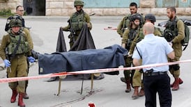 Israeli soldier detained after being filmed shooting assailant