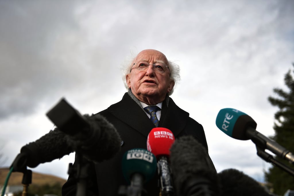 President Michael D Higgins speaks to the media after the funerals of Robert Garwe and his daughter Shauna on Saturday. PhotographL Charles McQuillan/Getty Images