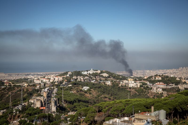 Smoke rises above Beirut's southern suburbs on Thursday after another night of air strikes. Photograph: Sally Hayden