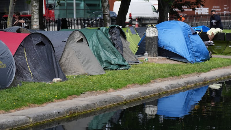 Tents were pitched by asylum seekers next to the Grand Canal at Wilton Place in Dublin following an earlier operation to clear about 100 tents from the area. Photograph: Niall Carson/PA Wire