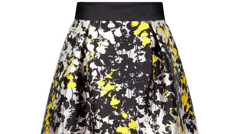 A black and silver leaf print midi for €238 by FeeG. For stockists visit www.feeG.ie