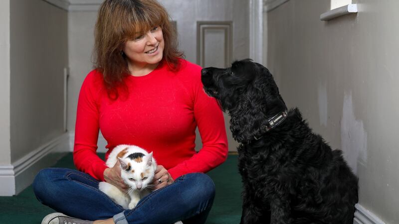 12/11/20: Actress Tara Flynn with her cocker spaniel Jack and cat Buffy.Photograph by Crispin Rodwell for the Irish Times