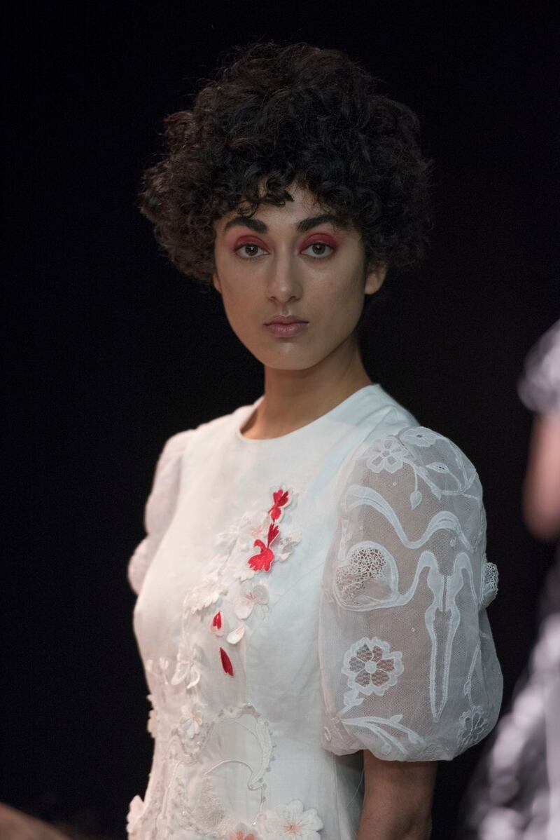 From Natalie B Coleman’s ‘Sisters’ collaboration with the UNFPA: a wedding dress, featuring Carrickmacross lace sleeves with motifs of vagina and clitoris