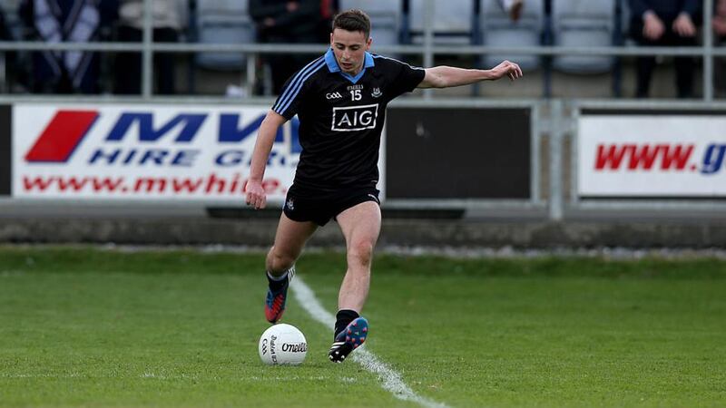 Dublin’s Cormac Costello kicks the winning point in the last minute of normal time during the All-Ireland under-21 football semi-final against Cavan at O’Moore Park in Portlaoise. Photograph: Donall Farmer/Inpho
