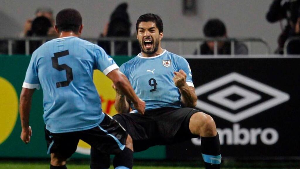 Uruguay’s Luis Suarez (right) is likely to return against Manchester United on Wednesday night. Photograph: Enrique Castro-Mendivil/Reuters