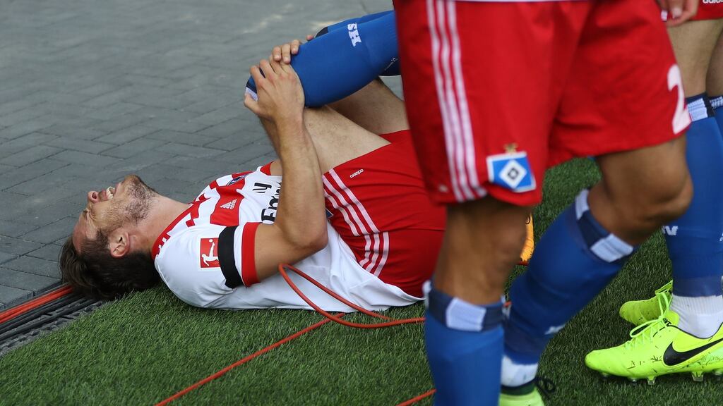 Hamburg’s Nicolai Müller tore his cruciate while celebrating his goal in the Bundesliga match against  Augsburg at Volksparkstadion  in Hamburg. Photograph: Oliver Hardt/Bongarts/Getty Images
