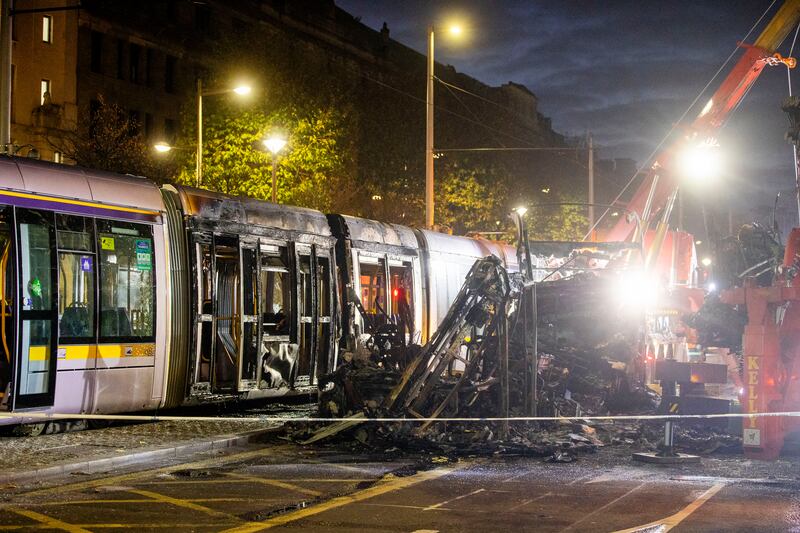 A view burnt out bus and Luas on O'Connell Street. Photograph: Tom Honan / The Irish Times