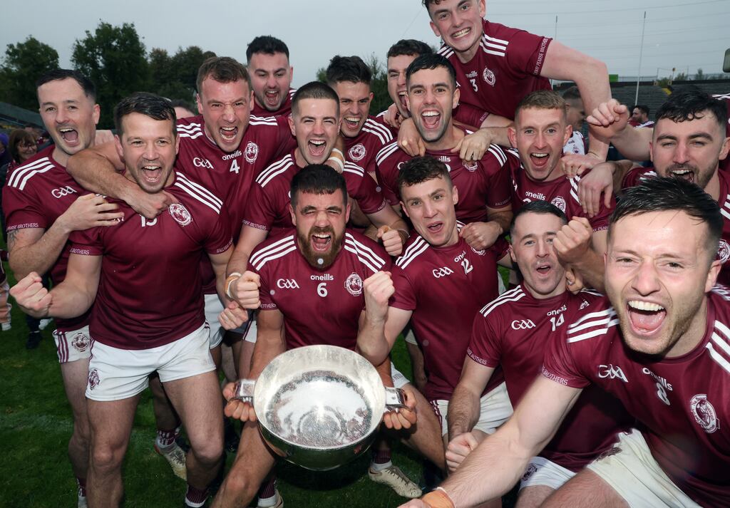 Ballybay players celebrate their win. Photograph: John McVitty/Inpho