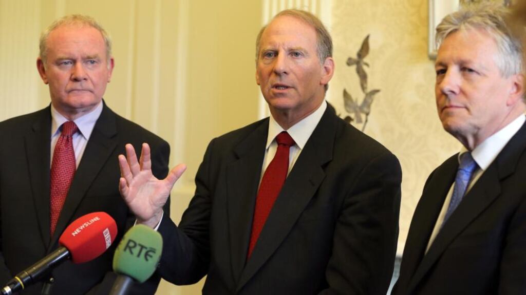 Richard Haass (centre) with Northern Ireland First Minister Peter Robinson (right) and Deputy First Minister Martin McGuinness during a press conference at Stormont Castle in Belfast yesterday.  Photograph: Paul Faith/PA Wire