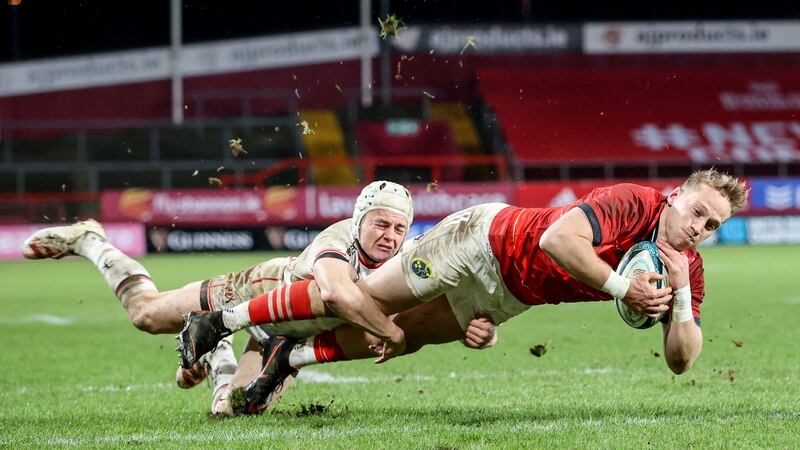 Mike Haley scores out wide despite the best efforts of Lowry. Photograph: Dan Sheridan/Inpho