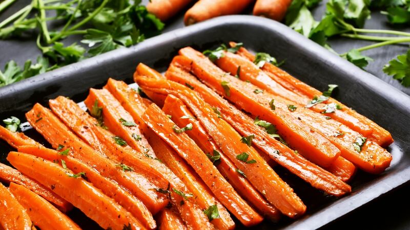 Carrots coated in knotweed dressing.