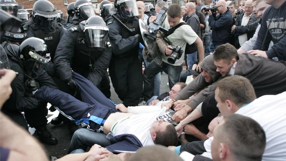 Police and protesters in Ardoyne, Belfast ahead of the Orangemen march past the nationalist area on their way back from the 12th July parade in 2010. Photograph: Dara Mac Dónaill/The Irish Times