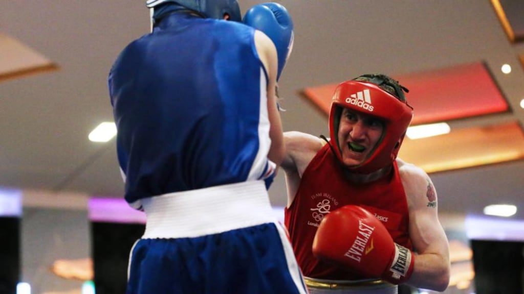 Ireland’s Paddy Barnes (Red) in action against France’s Dylan Beccu in Cork. Photograph: Cathal Noonan/Inpho