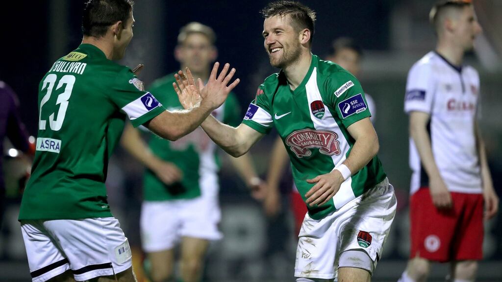 Cork’s Steven Beattie celebrates scoring their third goal of the game with Mark O’Sullivan. Photo: Ryan Byrne/Inpho