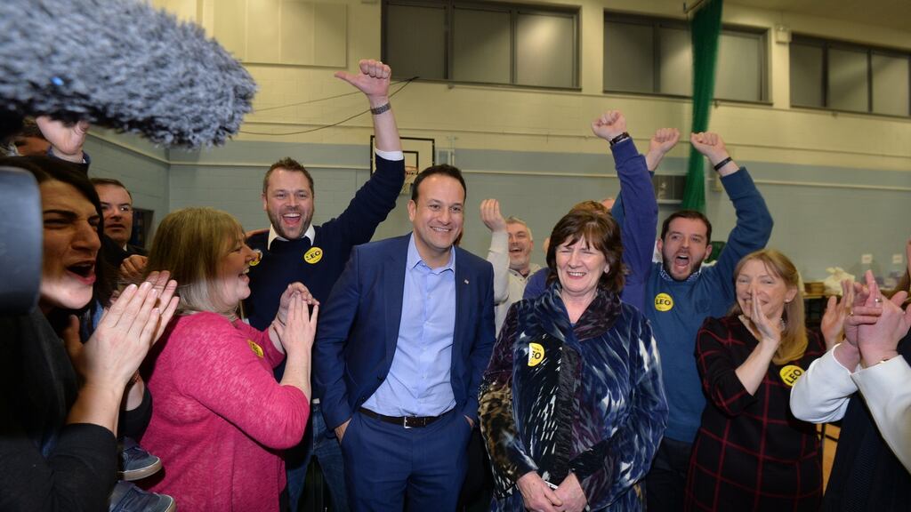 Leo Varadkar celebrates being re-elected with his mother Miriam and supporters at the Dublin West count centre at Phibblestown near Ongar. Photograph: Alan Betson