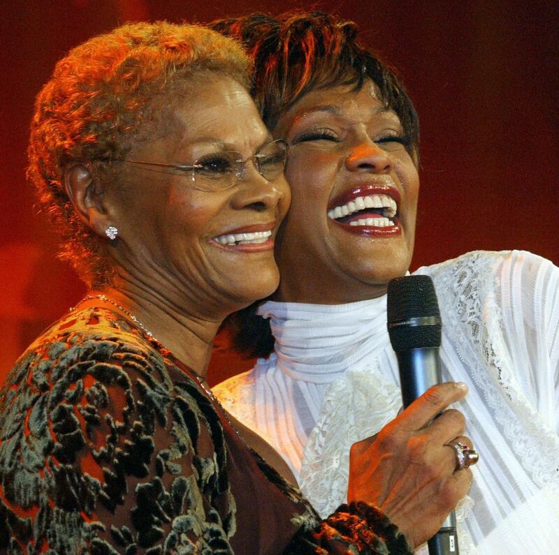 Dionne Warwick with her cousin Whitney Houston in 2004. Photograph: Jochen Luebke/DDP/AFP via Getty