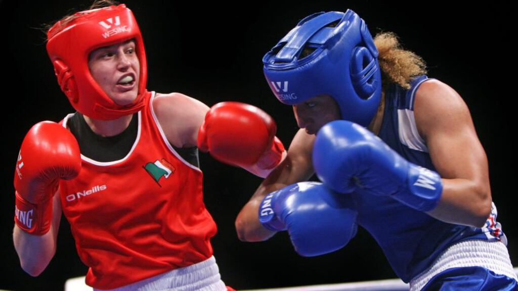 Katie Taylor (left) in action against Estelle Mossely during the 60kg final at the Polyvalent Arena in Bucharest, Romania. Photo: Octavian Cocolos/Inpho