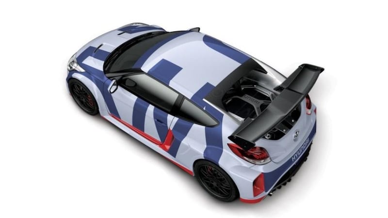 Hyundai’s mid-engined Veloster concept hints at a sportier, more aggressive future.