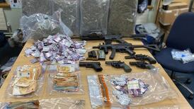 Gardaí seize cash, drugs, imitation firearms in Dublin property