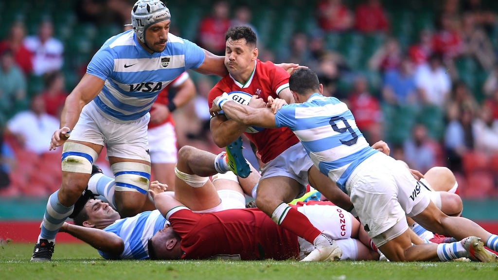 Wales’ Tomos Williams is tackled by Argentina’s Tomas Lavanini (left) and Tomas Cubelli. Photograph: Ashley Western/PA