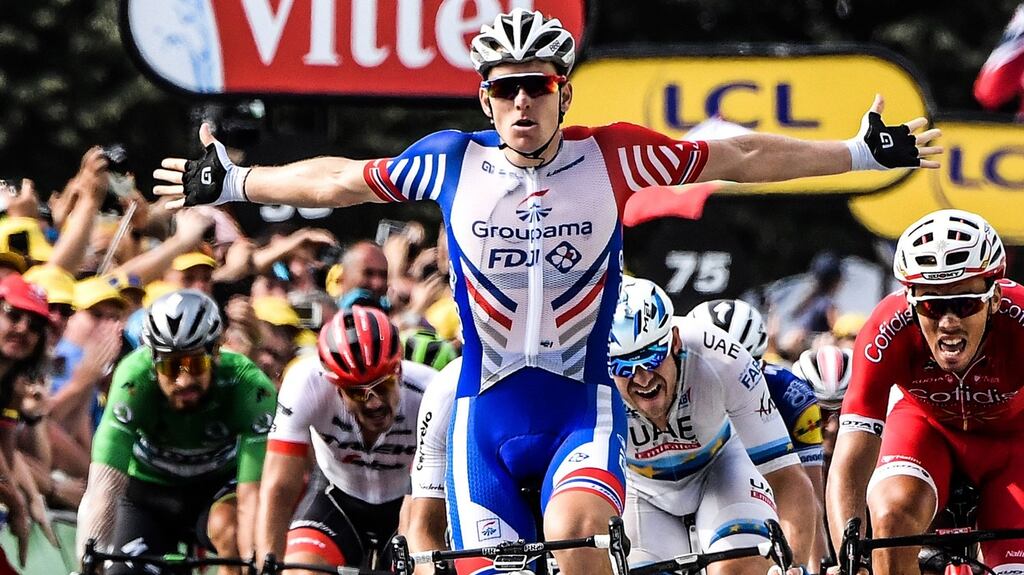 France’s Arnaud Demare celebrates as he crosses the finish line to win the 18th stage of the Tour de France between Trie-sur-Baise and Pau. Photograph: Jeff Pachoud/AFP/Getty Images