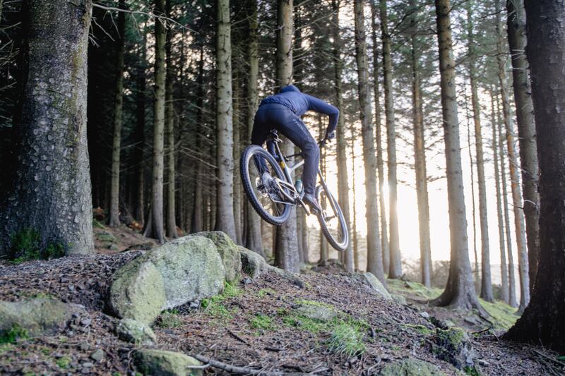 Champion turned bike coach Kevin Moran in action catching some air on the trails.