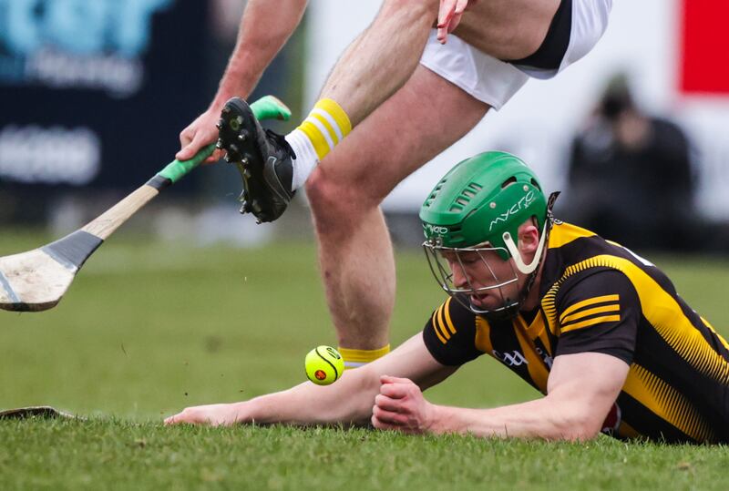 Kilkenny's Martin Keoghan in a challenge with Antrim's Paddy Burke. Photograph: John McVitty/Inpho