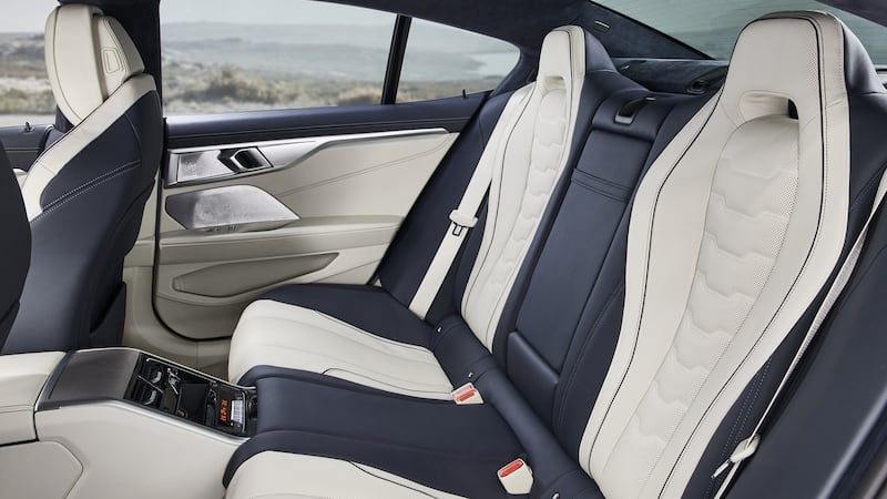 The Gran Coupe’s sculpted rear seats are surprisingly comfortable.