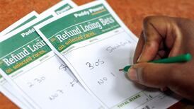 Paddy Power lowers profit forecast