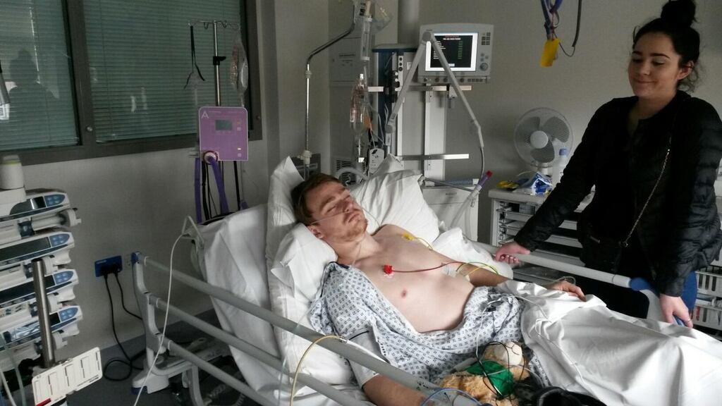 Mitchell Pettett with his girlfriend Abby Morris in the Mater Hospital in Dublin. Photograph: Bryce Pettett