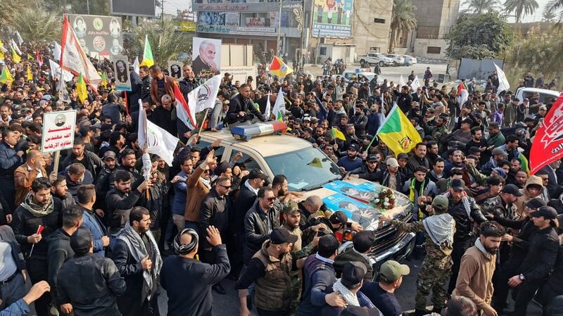 Mourners attend the funeral of the Iranian Major-General Qassem Suleimani . Photograph: Thaier al-Sudani/Reuters