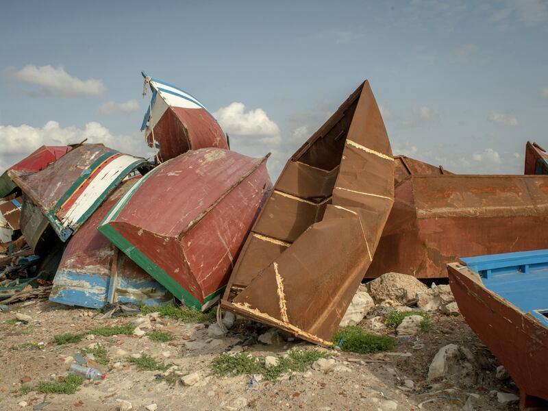 FILE — A collection of boats used by migrants attempting to cross the Mediterranean to Italy from a small port outside Sfax, Tunisia, May 26, 2023. Traffickers in Tunisia have been using small, rickety boats cobbled together from metal sheets to maximize the number of people motoring toward Italy. (Laura Boushnak/The New York Times)