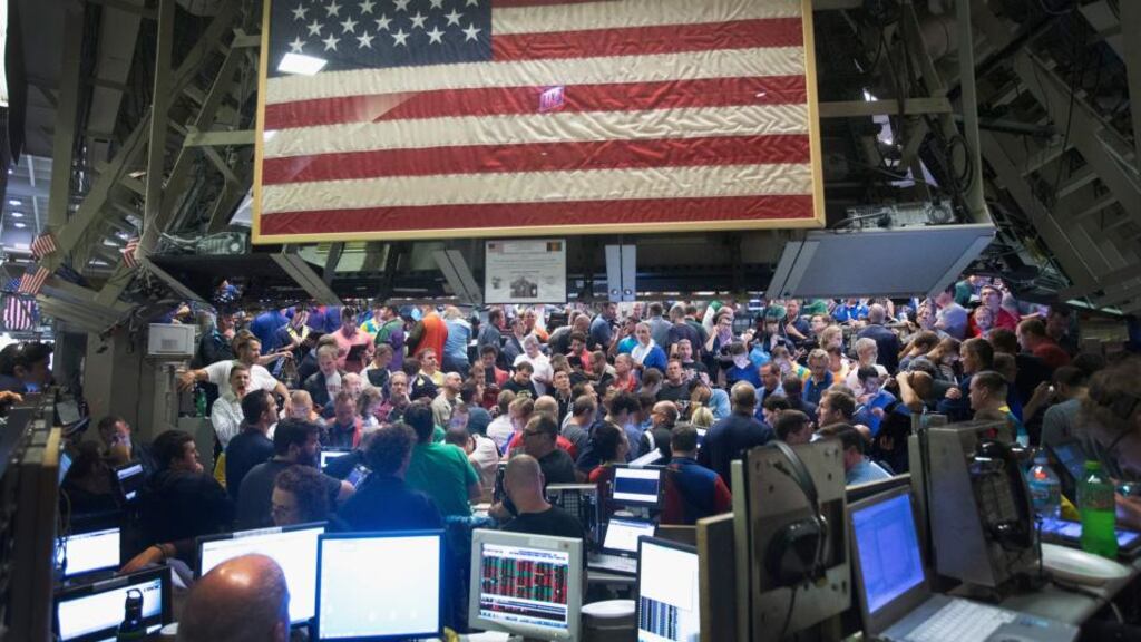 Traders at the Chicago Board Options Exchange (CBOE) react to the Federal Reserve’s decision on interest rates. Photo: Scott Olson/Getty Images