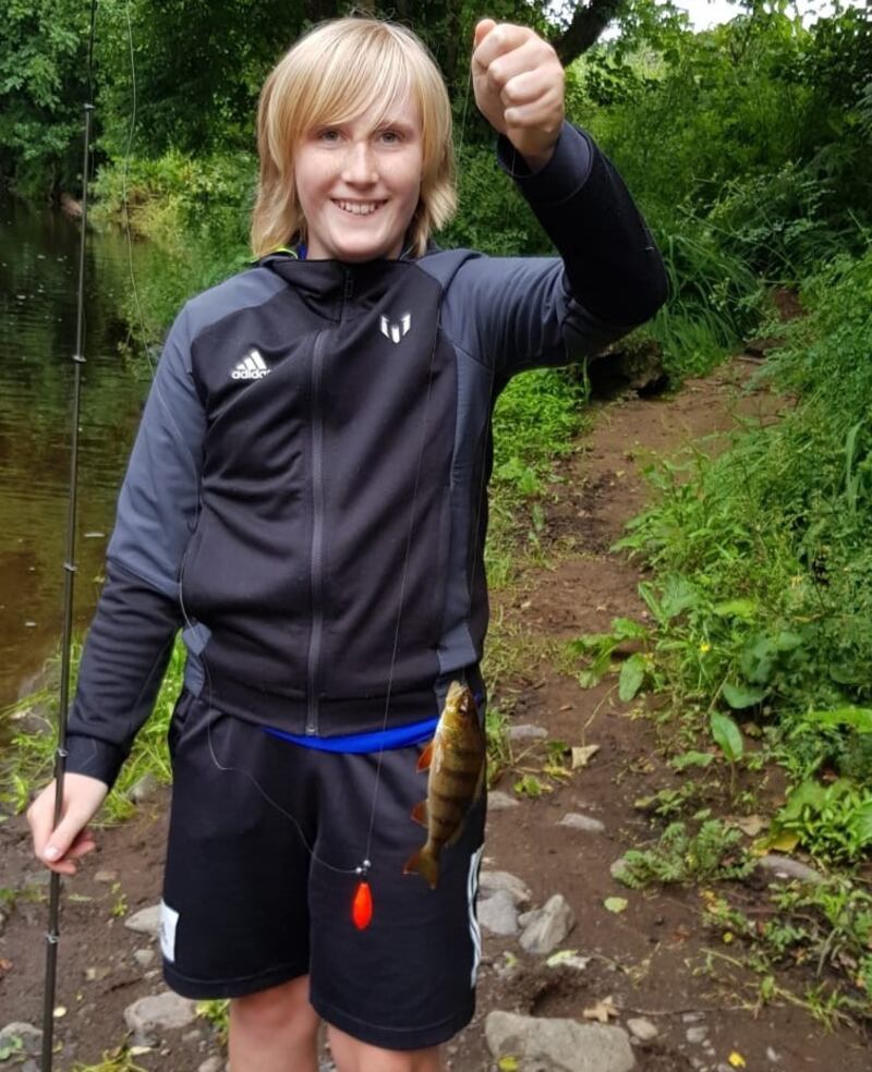Fionn Evans (11) delighted with his perch from the river Flesk, Killarney, Co Kerry.