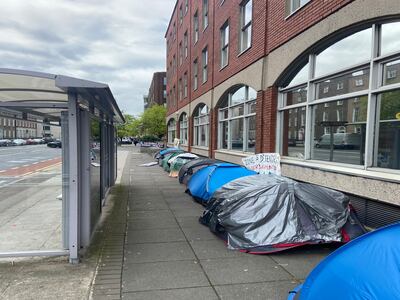 Dozens of homeless international protection applicants sleep in tents outside the International Protection Office. Photograph: Nathan Johns
