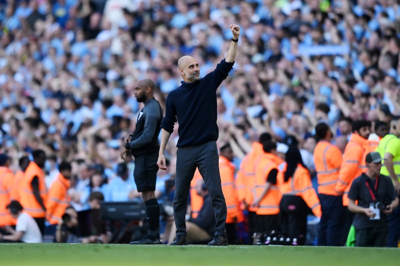 Manchester City manager Pep Guardiola acknowledges the fans as he celebrates during the Premier League game against West Ham at the Etihad Stadium. Photograph: Justin Setterfield/Getty Images
